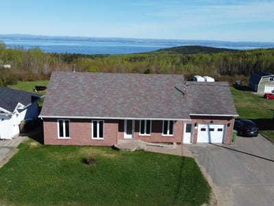/international/ca/2400-boul-malcolm-fraser-la-malbaie-quebec-310107972837/