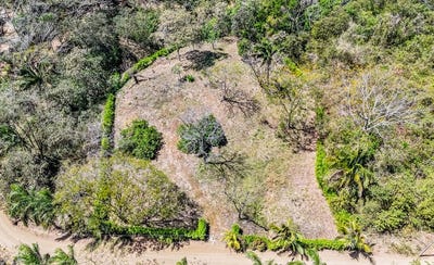 /international/cr/lote-del-bosque-beautiful-acre-lot-in-montana-playa-samara-guanacaste-province-120090164336/