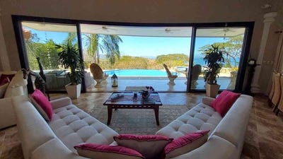/international/cr/id-4178-elegant-coastal-villa-with-infinity-pool-and-lush-gardens-paquera-puntarenas-310108866420/