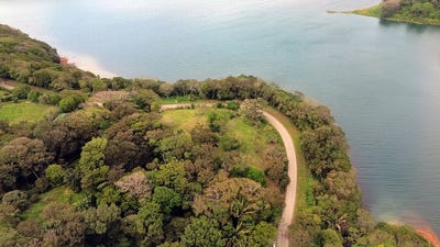 /international/cr/lago-azul-under-contract-sale-pending-lake-view-lot-of-just-under-1-acre-nuevo-tronadora-guanacaste-province-310106827539/