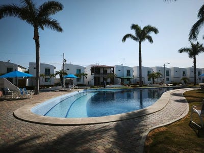 /international/ec/like-new-home-on-large-corner-lot-gated-community-living-near-the-beach-ciudad-punta-carnero-punta-carnero-santa-elena-province-310107295797/