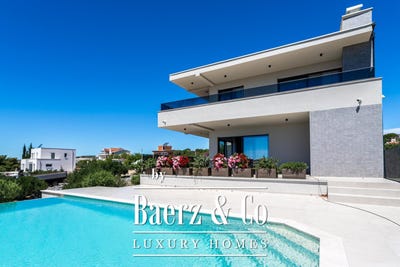 /international/hr/ul-kamenar-2a-22202-primosten-croatia-primosten-sibenik-knin-county-310109222115/