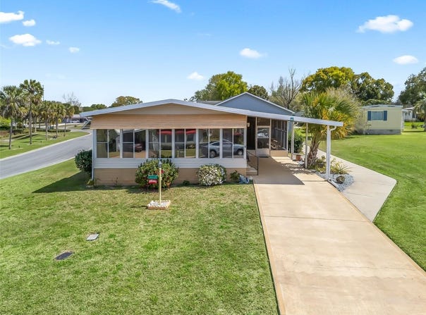 802 WEEPING WILLOW AVENUE, THE VILLAGES, FL 32159