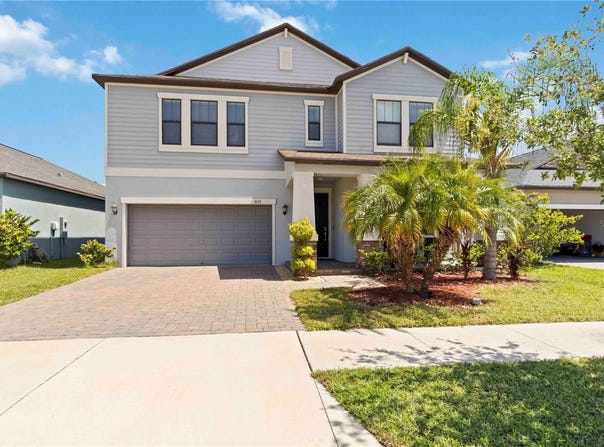 7213 WASH ISLAND DRIVE, SUN CITY CENTER, FL 33573