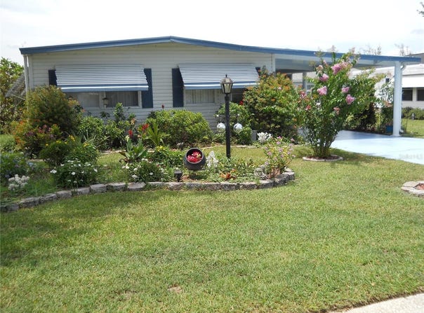 919 WEEPING WILLOW AVENUE, LADY LAKE, FL 32159