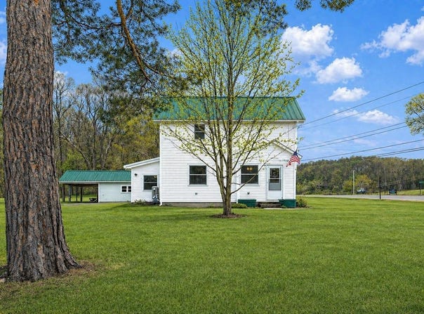 111 W FOREST HOME AVENUE, BELLAIRE, MI 49615