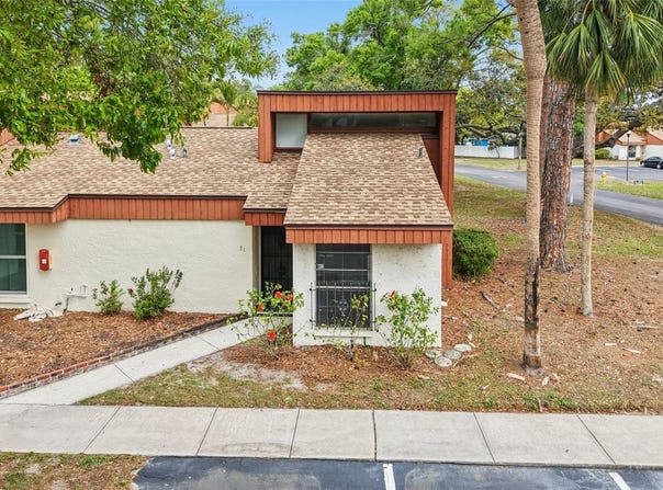 2064 SUNSET POINT ROAD, CLEARWATER, FL 33765