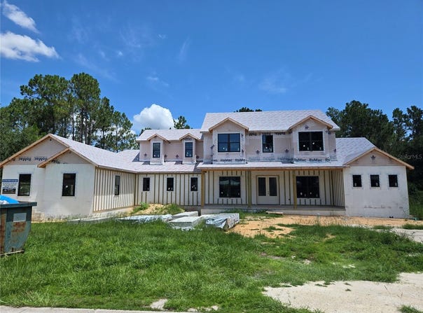 405 LONG AND WINDING ROAD, HOWEY IN THE HILLS, FL 34737