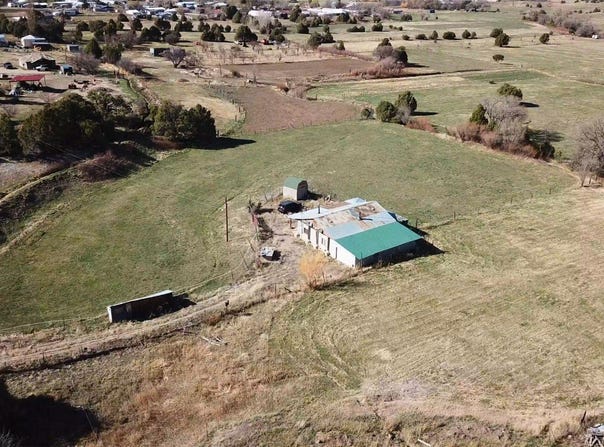 31 Lower Ojitos Rd, Penasco, NM 87521