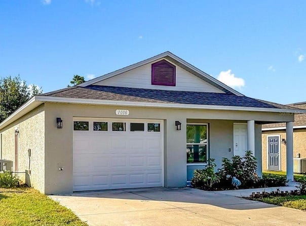 1006 DORA AVENUE, TAVARES, FL 32778