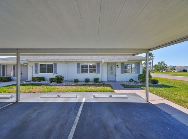 124 GLOUCESTER BOULEVARD, SUN CITY CENTER, FL 33573
