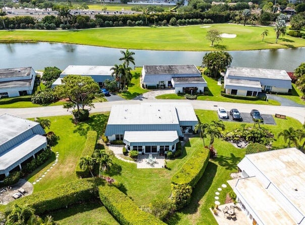 401 French Royale Circle, Atlantis, FL 33462