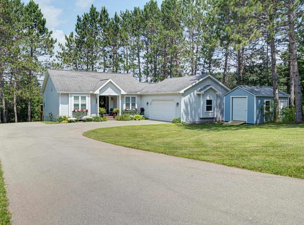 7070 APPOLLO LAKE LANE, TRAVERSE CITY, MI 49685-7052
