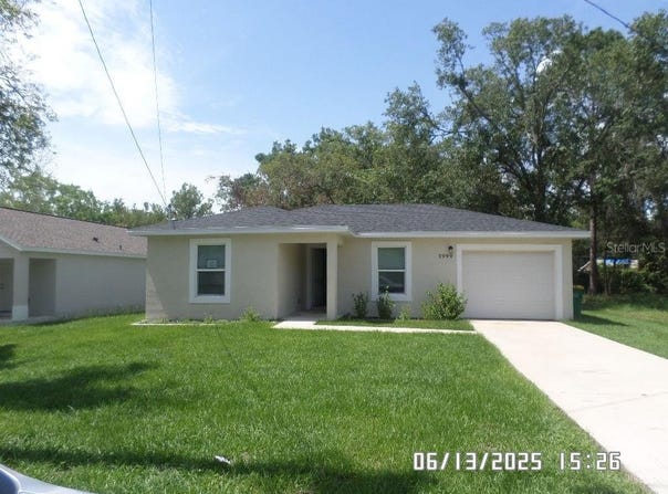 1999 HOLLYWOOD AVENUE, EUSTIS, FL 32726