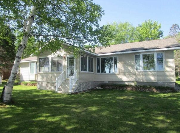 9218 PACHY RD, CARP LAKE, MI 49718