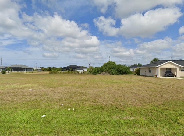 303 BOUNDARY Boulevard, ROTONDA WEST, FL 33947