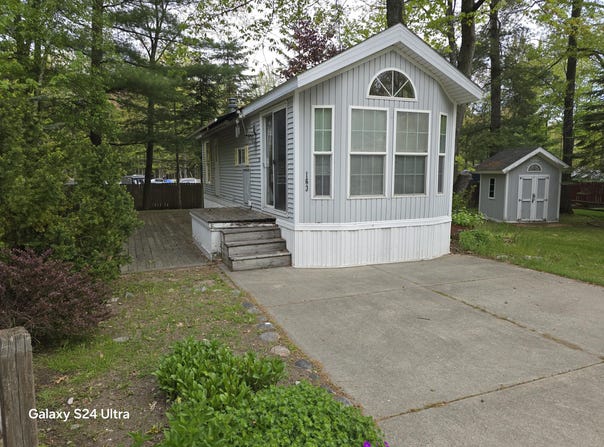 2757 Owens, Unit #163 Drive, Houghton Lake, MI 48629