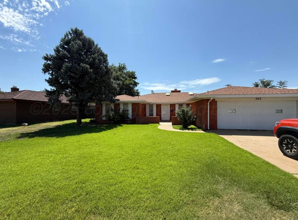 303 BAILEY Avenue, Dumas, TX 79029-3421