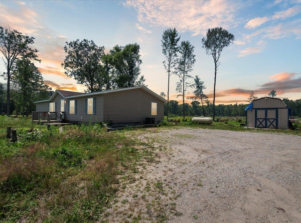 939 N Coleman Road, Shepherd, MI 48883