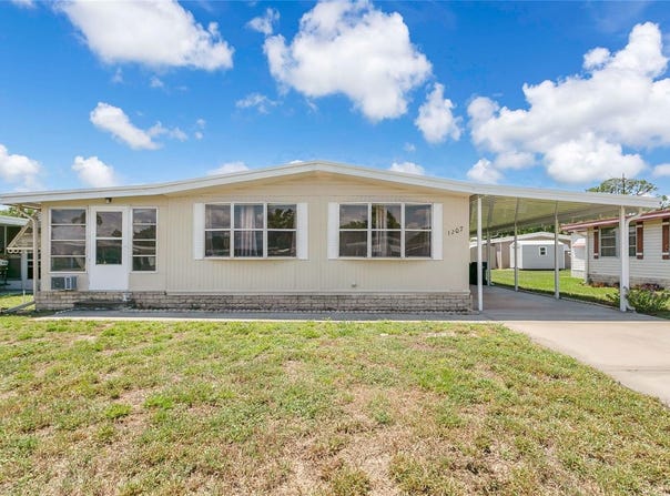 1207 APACHE CIRCLE, TAVARES, FL 32778