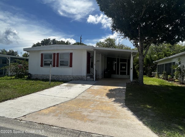 1117 Wren Circle, Barefoot Bay, FL 32976