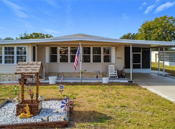 1311 MOHAWK CIRCLE, TAVARES, FL 32778