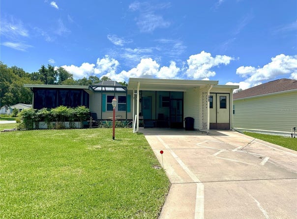 902 ROSE LANE, THE VILLAGES, FL 32159