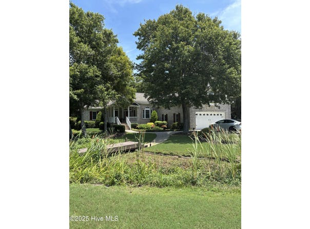 301 Wisteria Way, Caswell Beach, NC 28465