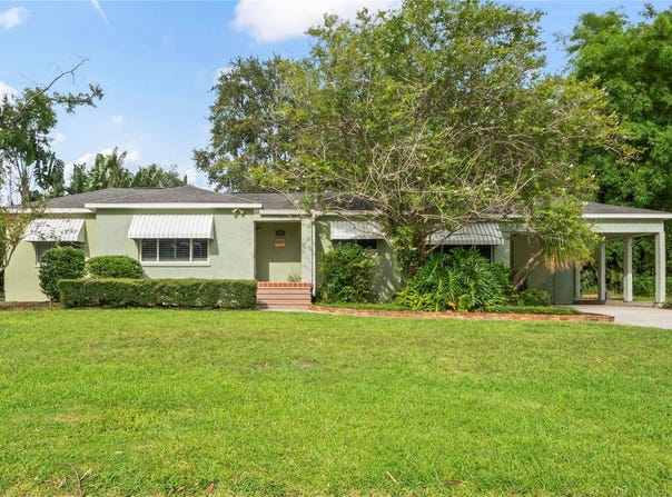 7515 N OLA AVENUE, TAMPA, FL 33604