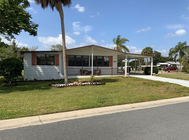 1802 PETUNIA LANE, THE VILLAGES, FL 32159
