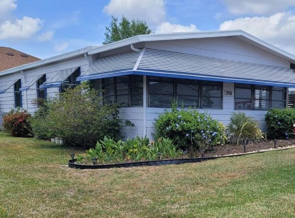 741 TRUMAN AVENUE, LADY LAKE, FL 32159