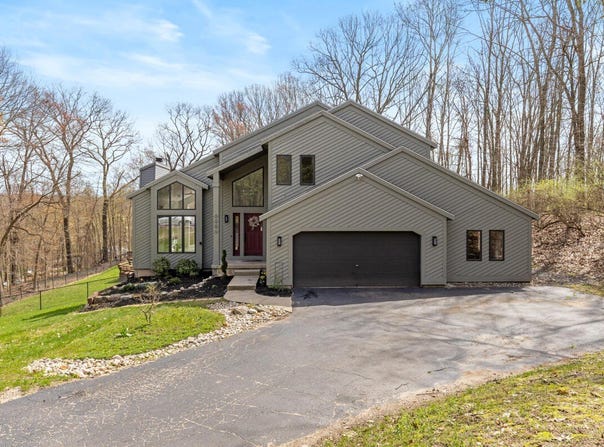 7721 Sun Quest Ridge Drive NE, Ada, MI 49301