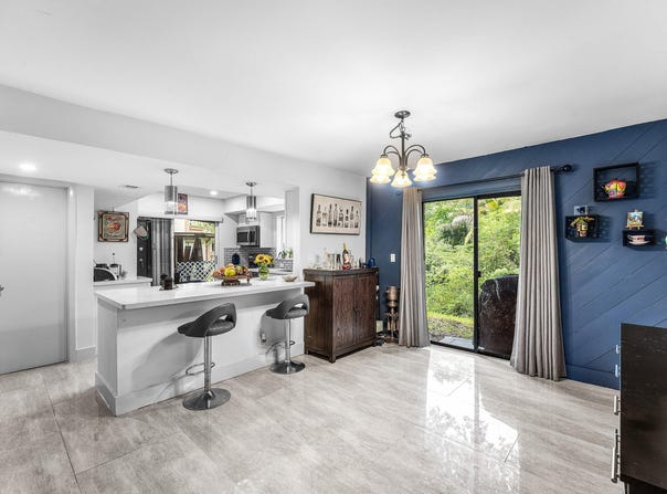 209 Wimbledon Lakes Drive, Plantation, FL 33324
