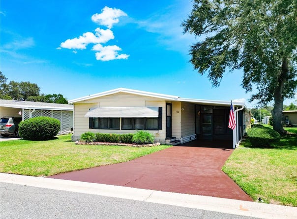 708 COACHMAN DRIVE, LEESBURG, FL 34748