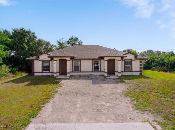 709/711 Harold Avenue S, Lehigh Acres, FL 33973