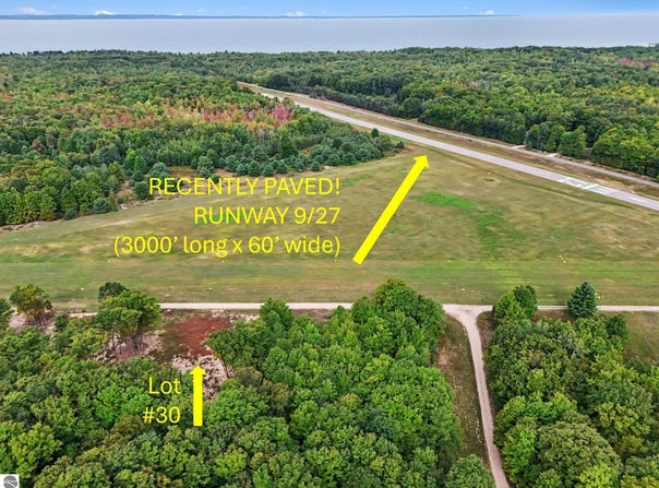 E Torchport Avenue, Kewadin, MI 49648