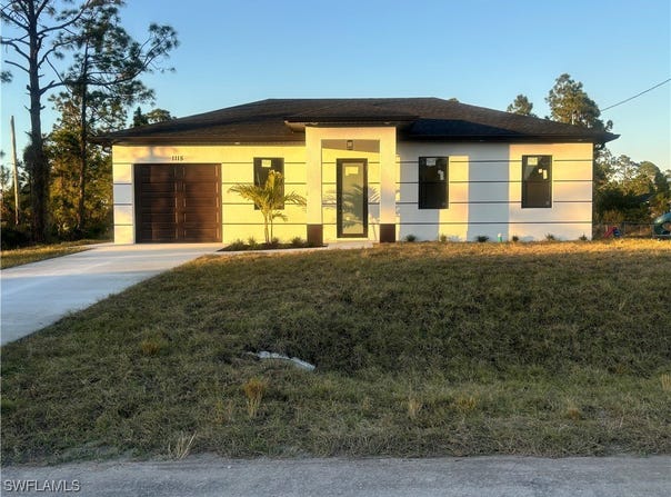 1115 cumming Street E, Lehigh Acres, FL 33974