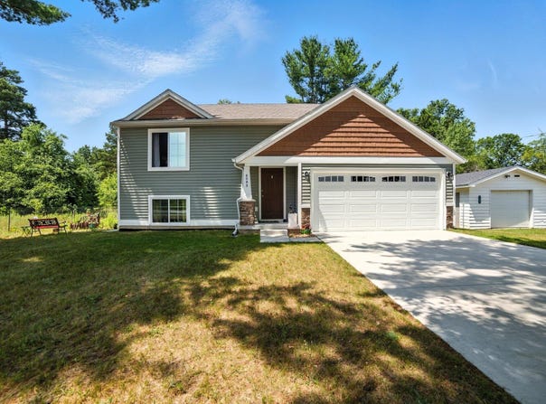 6593 N Maple Hill Road, Howard City, MI 49329