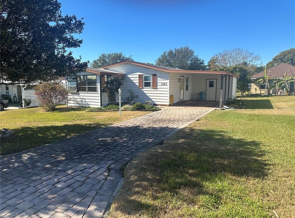 1404 PLANTATION DRIVE, THE VILLAGES, FL 32159