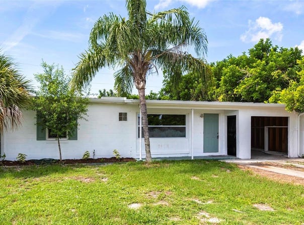 110 POINSETTIA CIRCLE NE, PORT CHARLOTTE, FL 33952