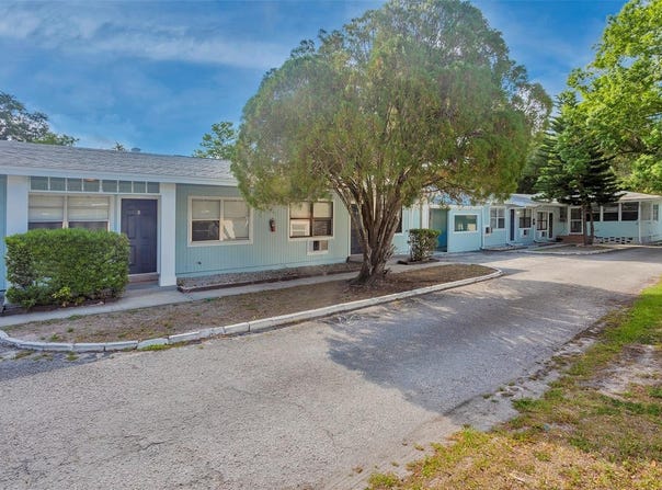 1102 SUNSET POINT ROAD, CLEARWATER, FL 33755