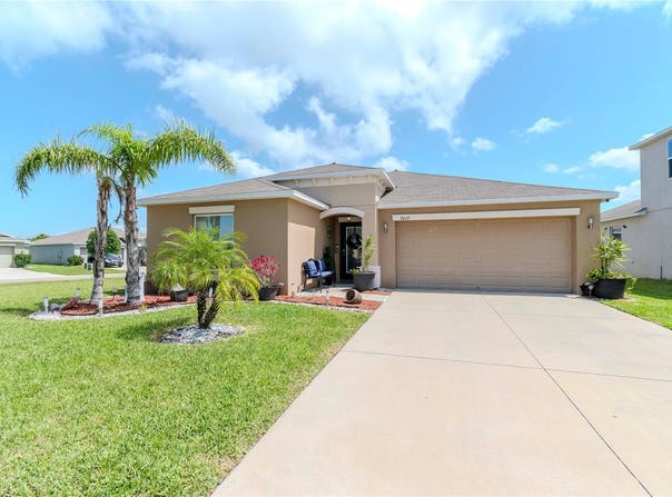 7019 WISEMAN RUN DRIVE, SUN CITY CENTER, FL 33573