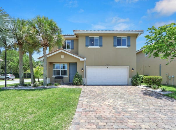 4701 Foxtail Palm Court, Greenacres, FL 33463