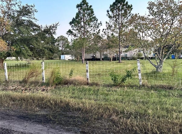 1025 WHISPERING CREEK WAY, OSTEEN, FL 32764