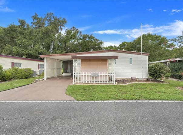 119 ROYAL PALM DRIVE, LEESBURG, FL 34748