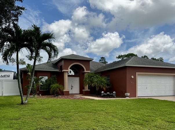 143 SW Glenwood Drive, Port Saint Lucie, FL 34984