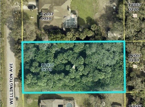 1516 Wellington Avenue, Lehigh Acres, FL 33972