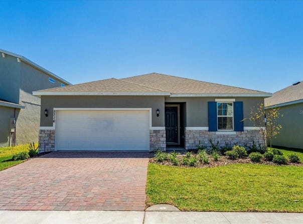 1018 SWAMP CHESNUT LOOP, LADY LAKE, FL 32159
