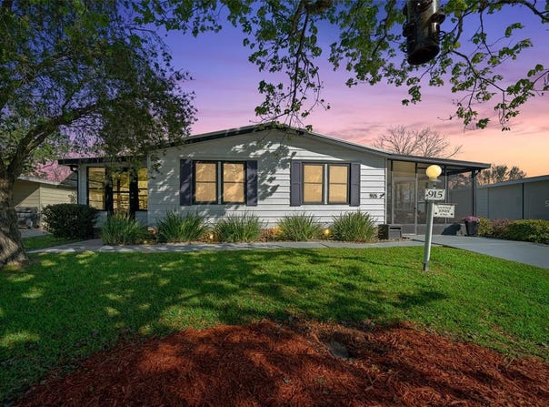 915 OLEANDER STREET, LADY LAKE, FL 32159