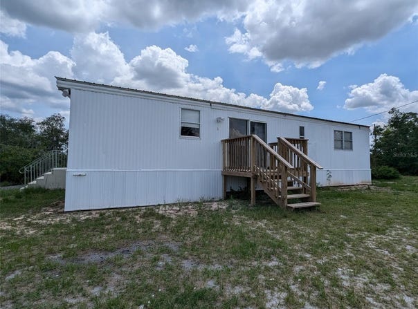 64 HOG ROAD, AVON PARK, FL 33825
